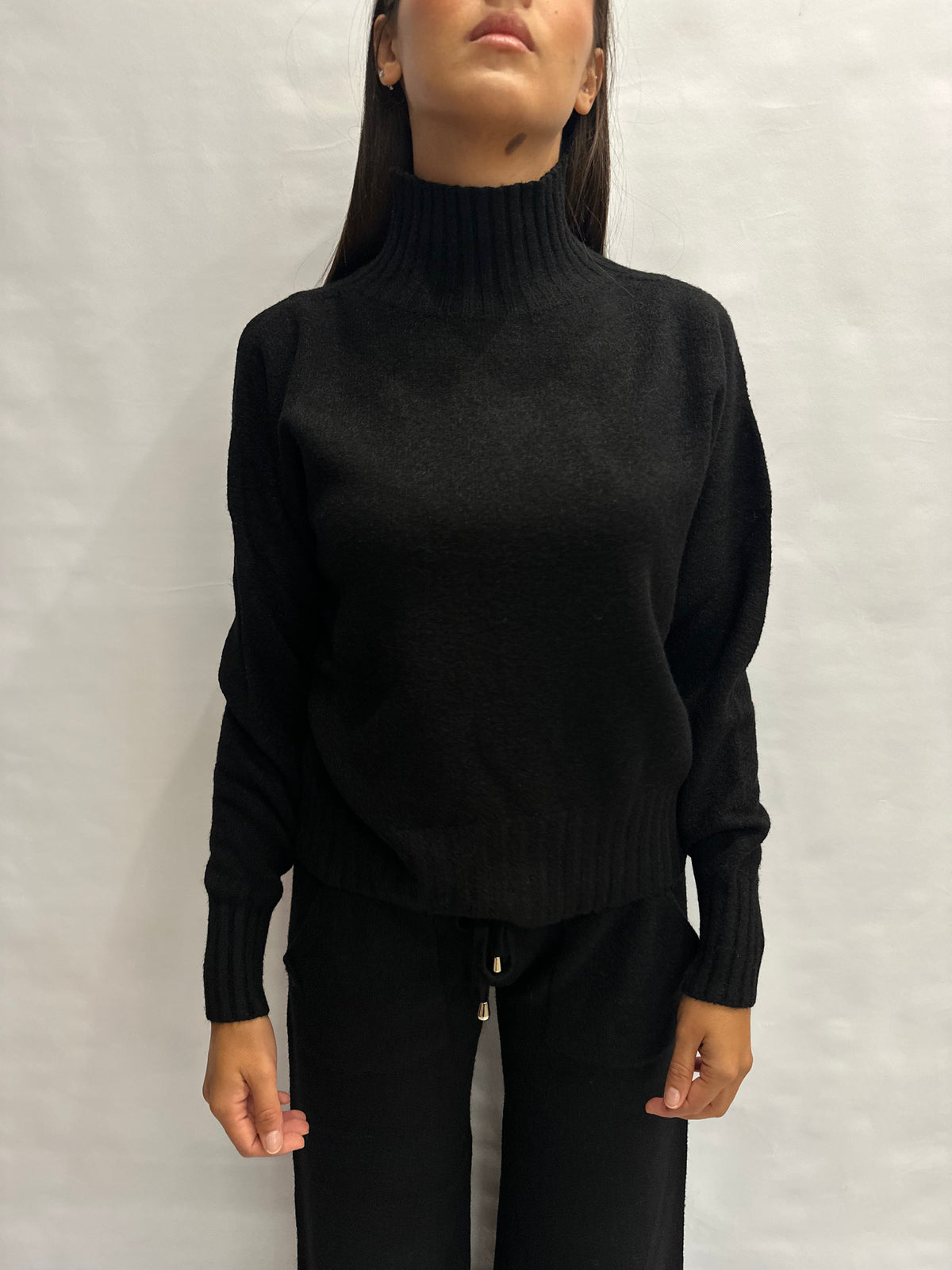 Coordinato BLUEJOINT in maglia composto da pantalone a zampa e maglia con collo a cratere , COD: 570145 E 570284